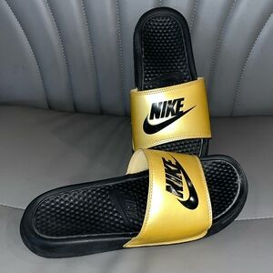 Women’s gold Nike slide sandals size 9